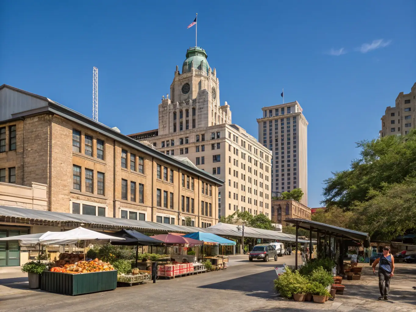 A vibrant street scene in the Pearl District of San Antonio, showcasing the area's modern architecture, bustling restaurants, and pedestrian-friendly environment. The image should convey a sense of urban energy and upscale living.